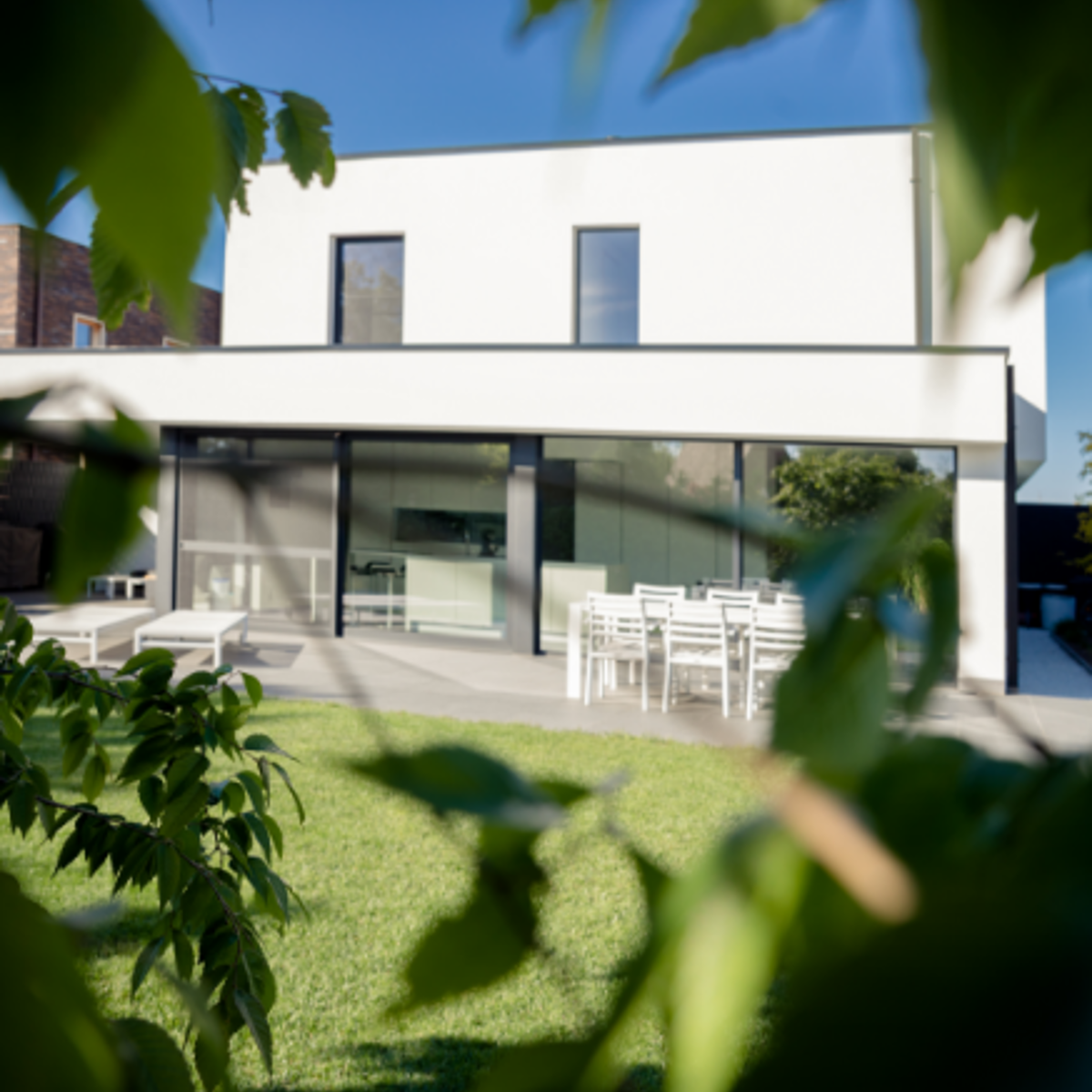 White Modern House With Leaves